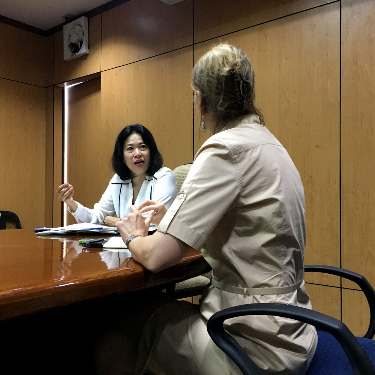 Martina Merten in conversation with Marijoy D Segui, deputy director of the Council of Welfare for the Children of the Philippines