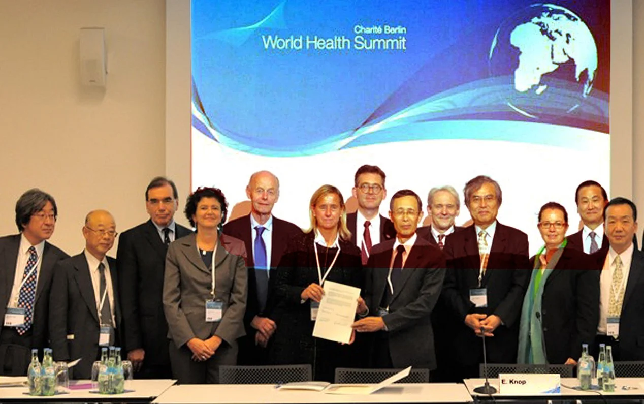 Signature of an official Cooperation Agreement between the Charité and Juntendo in 2011 by the Dean of the Charité Prof. Annette Grüters-Kieslich and by the President of Juntendo University Prof. Eiki Kominami during the World Health Summit 2011 in Berlin