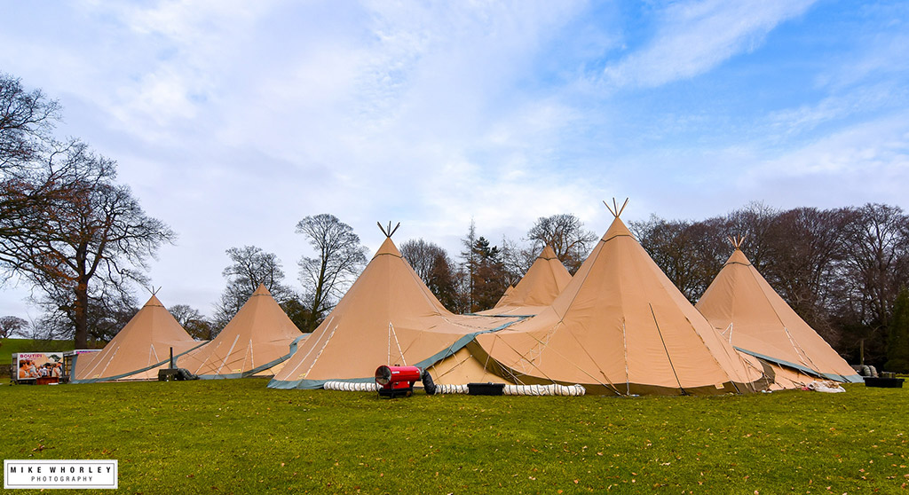 Outdoor-shot-of-the-tipis-with-the-vans.jpg