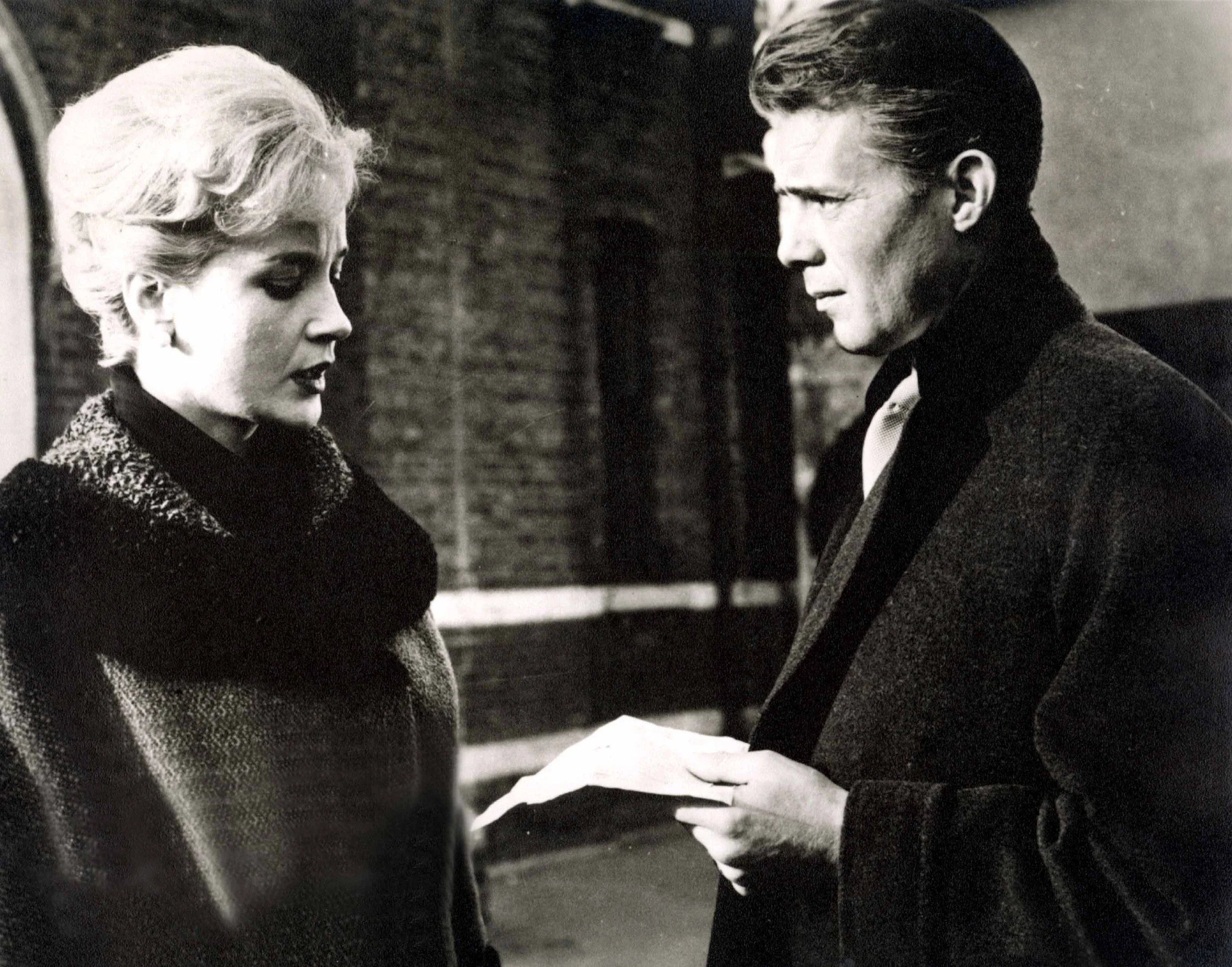Dick in Victim (1961) alongside Sylvia Sims