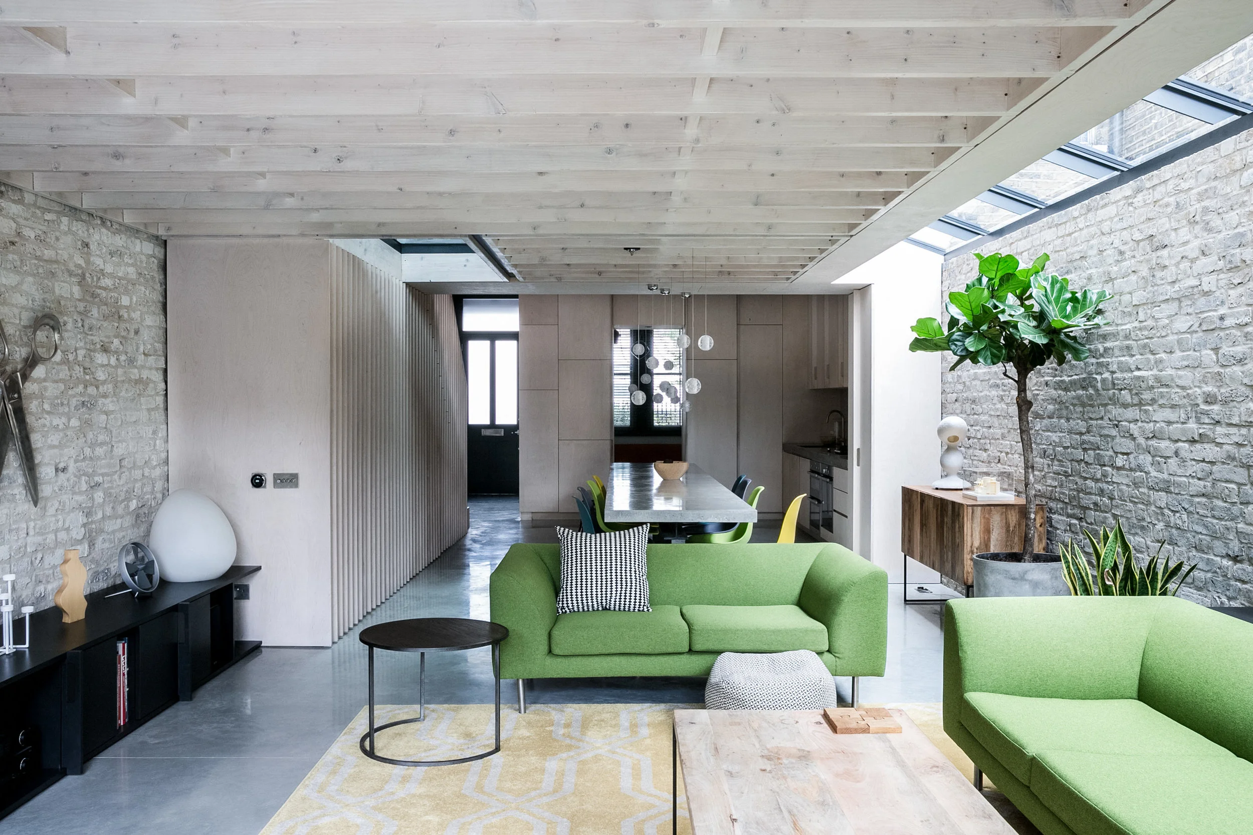 At ground floor the rear area hosts the kitchen, dining and living space in an open plan arrangement. At the front the traditional reception room has been retained.