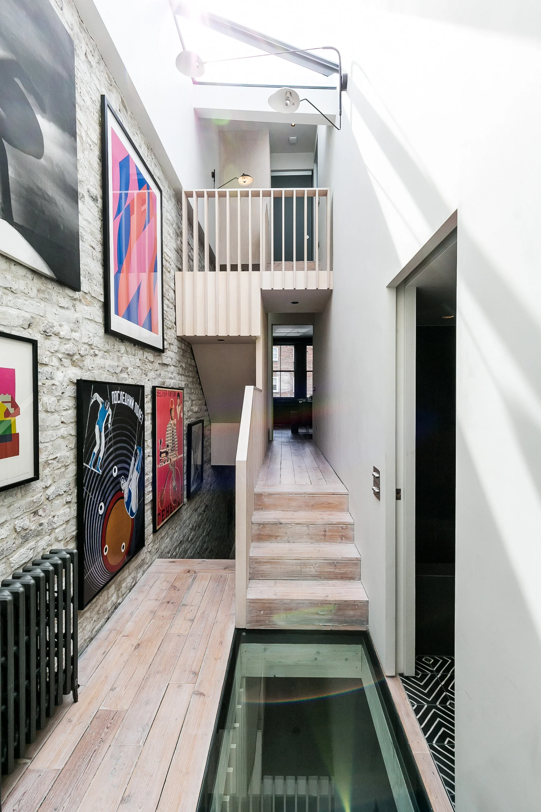 The existing loft space above the front of the house has been converted into a bedroom with a separate shower room.
