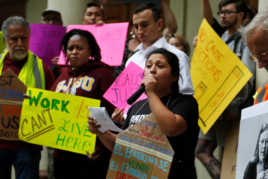 Jocelin Hernandez, center, addresses the crowd tenants’ rights advocates prepare to march down the Alameda in San Jose on April 7. (Patrick Tehan/Bay Area News Group)