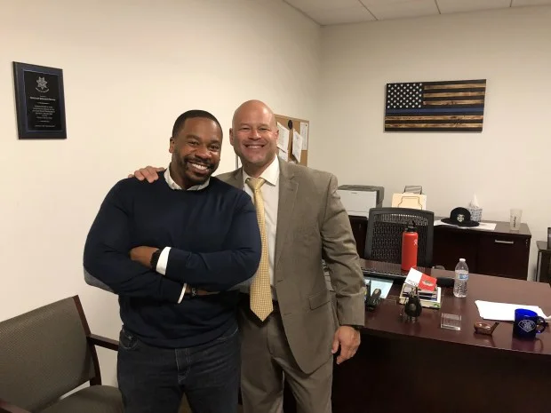 Pastor Jason Reynolds, left, of the Emmanuel Baptist Church in San Jose, and San Jose police Chief Eddie Garcia pose for a photograph Nov. 19, 2017 at the SJPD substation. (San Jose Police Dept.) 