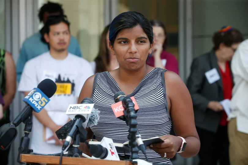 Sita Stukes of Women's March San Jose speaks in front of City Hall in San Jose, Calif., Monday, Aug. 6, 2018, at a rally over the the role of San Jose’s independent police auditor. (Karl Mondon/Bay Area News Group)