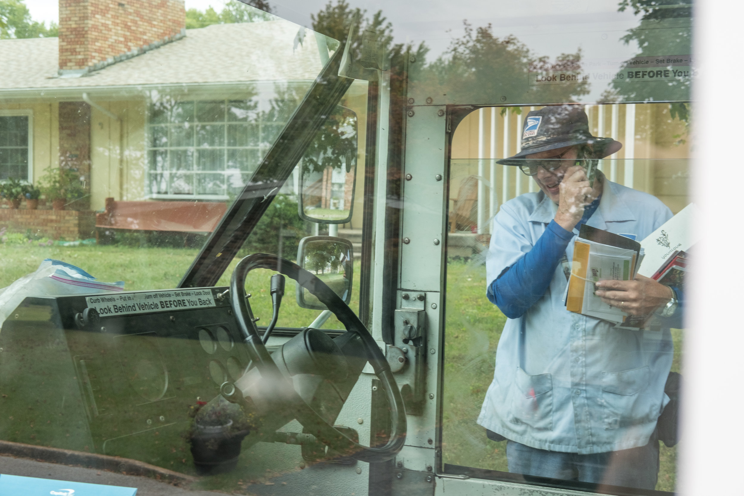  Times have changed since Greg's early days as a postal carrier. Scanners and cell phones are important tools today. 