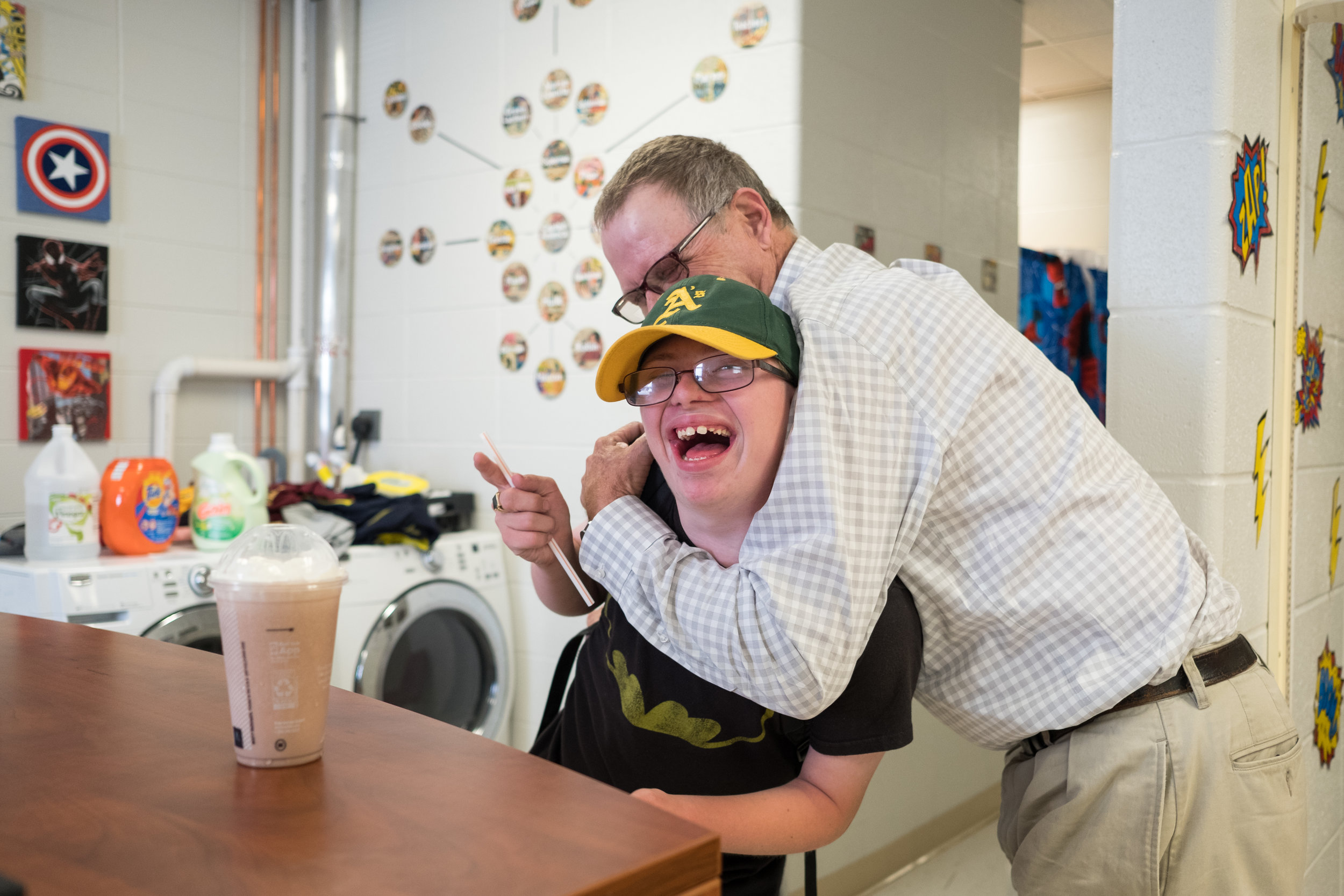  After Greg’s shift he picks up a chocolate shake for his son, Luke, to reward Luke for doing well in class. Luke, was born two months premature with a severely damaged heart and Downs Syndrome. 