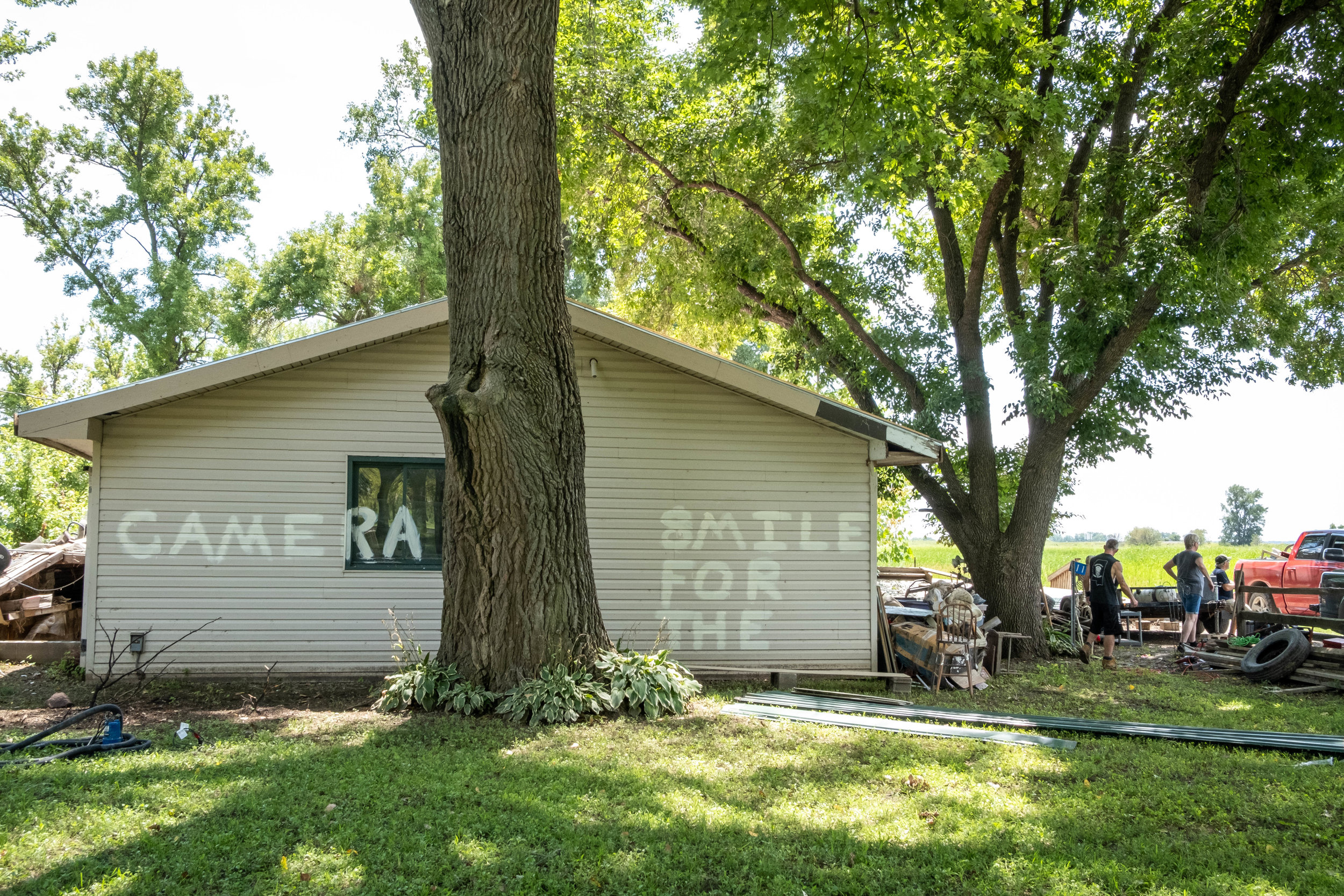  Dean Doty spray painted this message after his homestead was robbed by looters. 