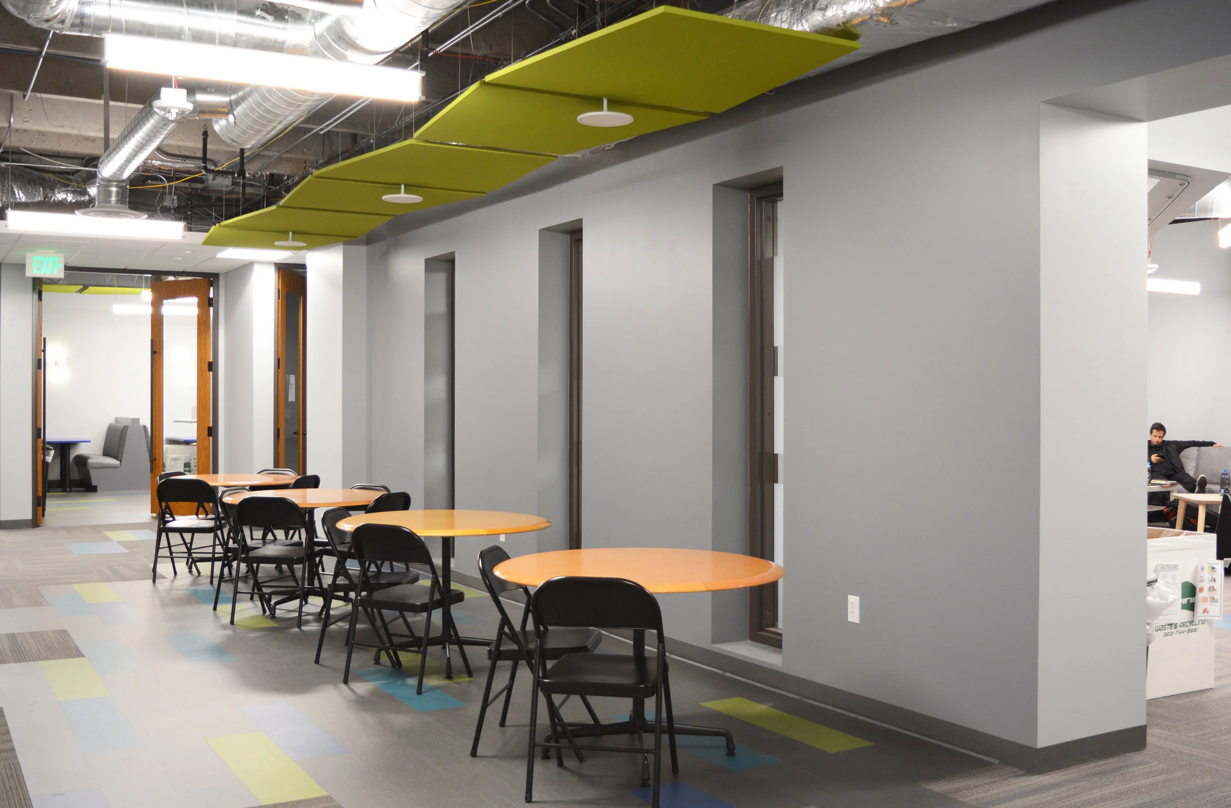 Although class schedules are staggered and the break room was designed to accommodate a generous amount of students, additional space in the suite was needed to handle the volume of all students eating at once. Replacing more of the carpet tiles with LVT allowed the break area to extend from the room itself, and provide a hallway for eating, studying and conversation.