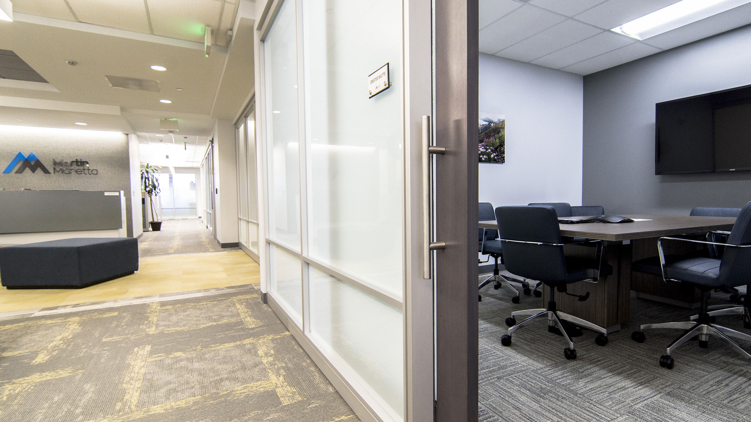 IE Connect provided and installed the Allsteel Beyond architectural walls as well as the workstations, which allowed us to coordinate laminates and maintain continuity with wood and wood-look finishes throughout the space. Merchants provided coordinated conference and meeting tables along with multiple seating options. Levels of privacy and room types varied throughout the space and in some cases gradated glazing film was added to the architectural wall system for enhanced visual privacy.