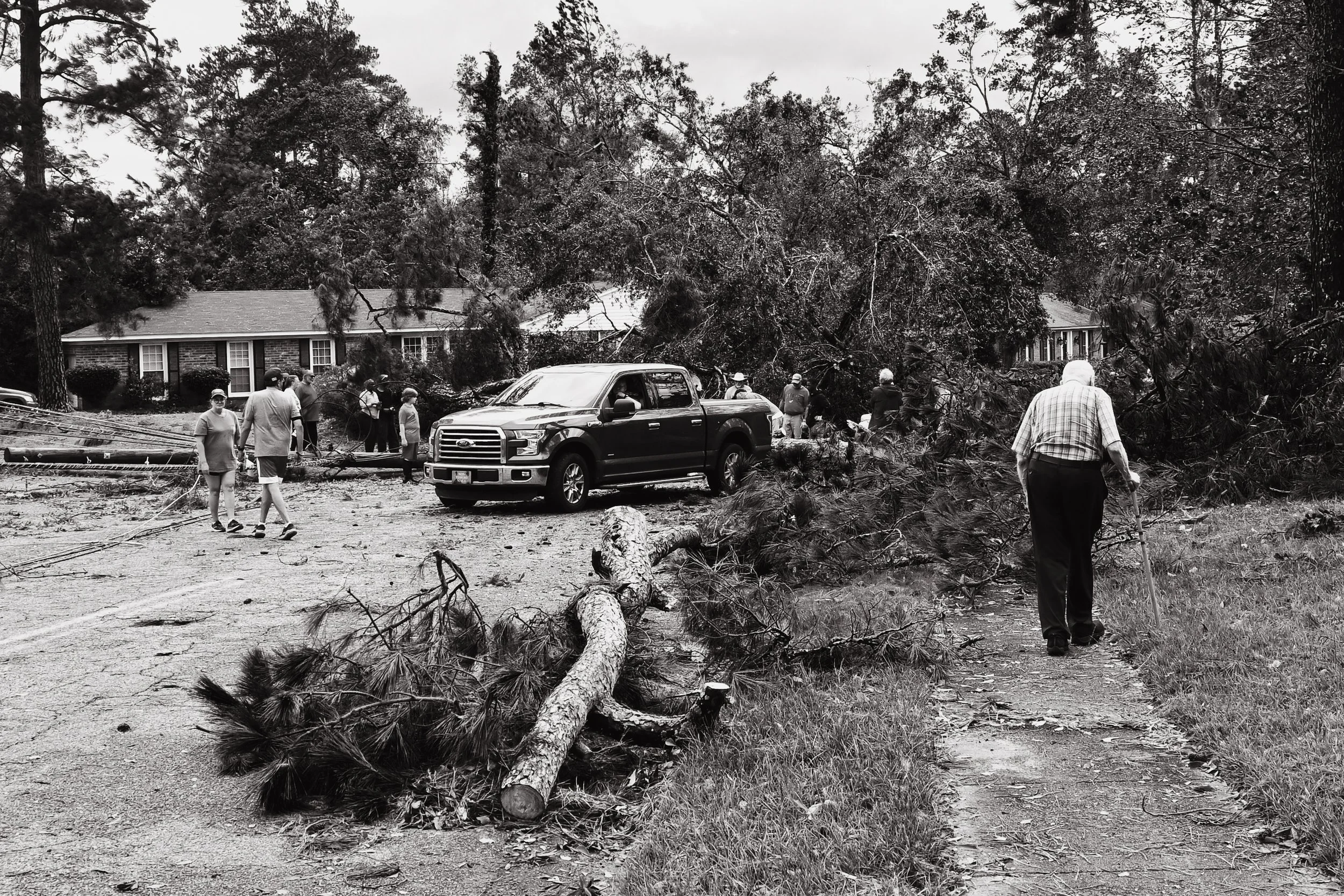 Erin_Tallent_Neighbors Clearing The Road Together.jpg