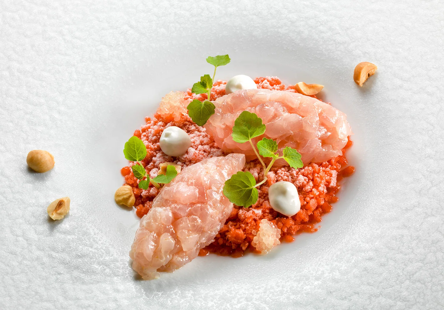 Amberjack tartare on strawberry granita, almond mousse and finger lime.jpg