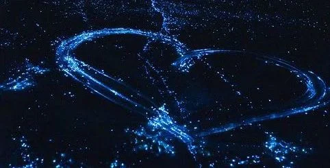 Tiny bioluminescent worms under the sand make a lovely glow.