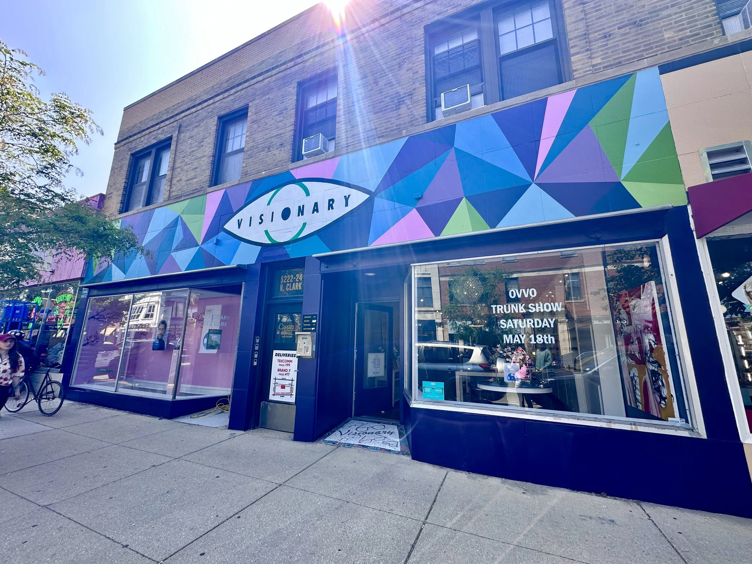 Chicago exterior storefront with a colorful geometric mural by professional painter, Ryan Tova Katz.