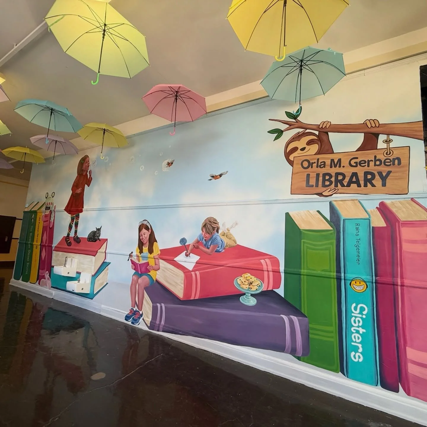 I was so honored to be a part of this deeply meaningful Project, creating a mural in memory of a truly special student, Orla Gerben. This piece was designed to celebrate her life, incorporating the things she loved most, all woven into a space where 