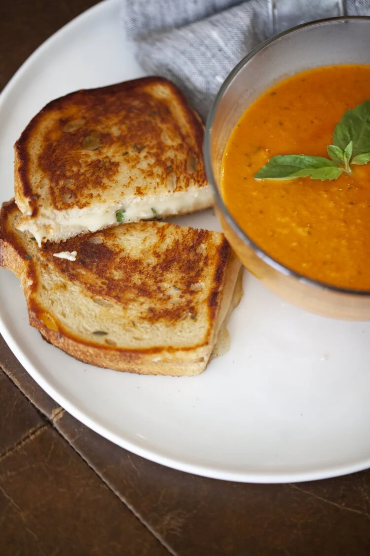 Butter-Roasted Tomato Soup with Honey’d Brie Grilled Cheese