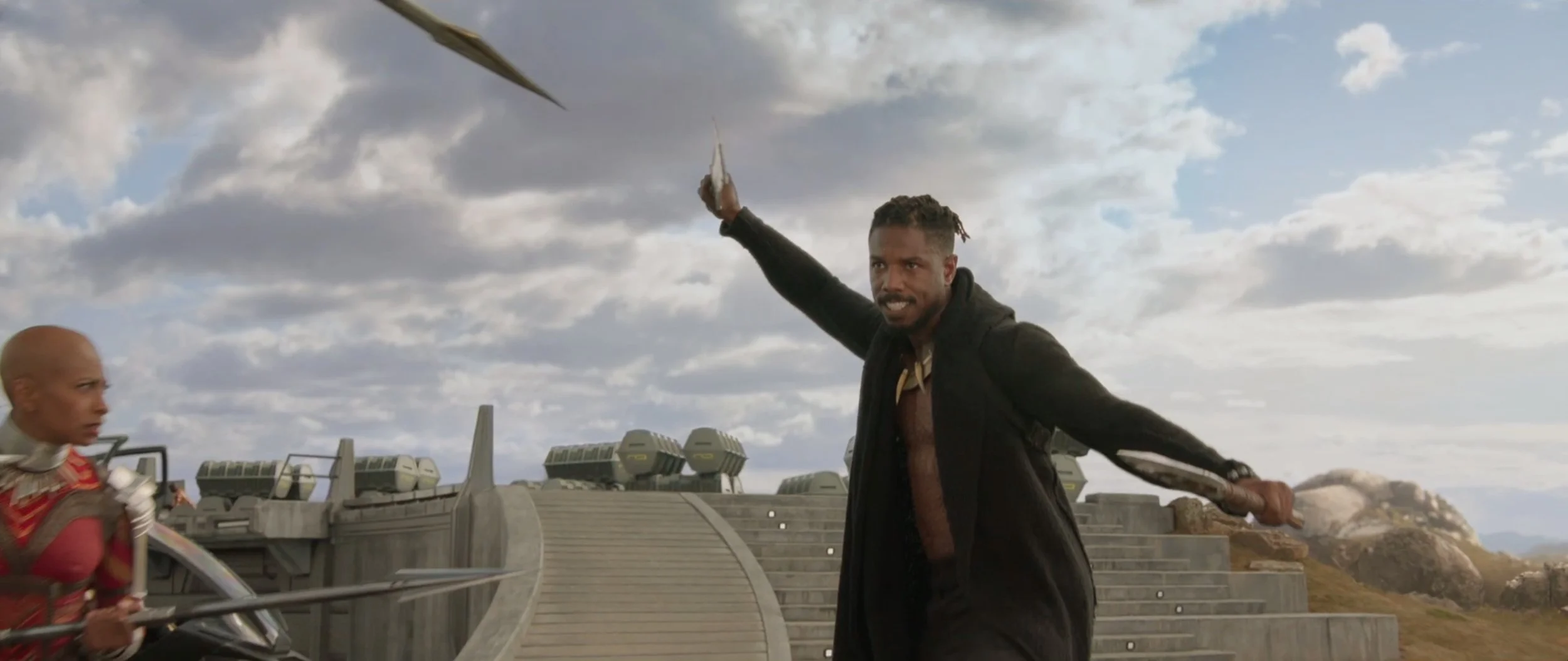 In the film, Killmonger's suit is materializing in this shot, but in this trailer it's just him looking cool.