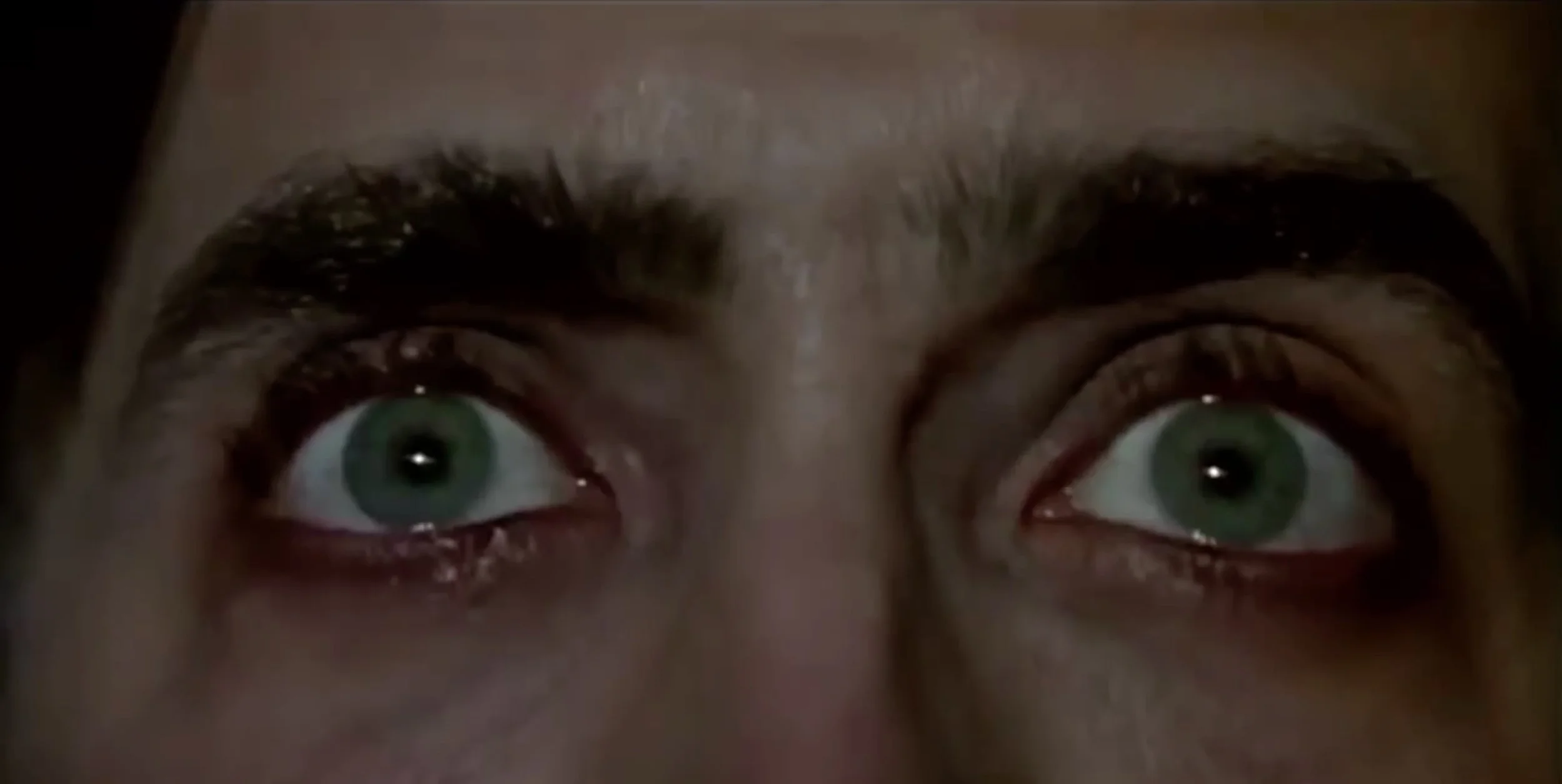 "Wow, you must've seen some things, huh?" cuts directly into this shot of Cage's eyes.