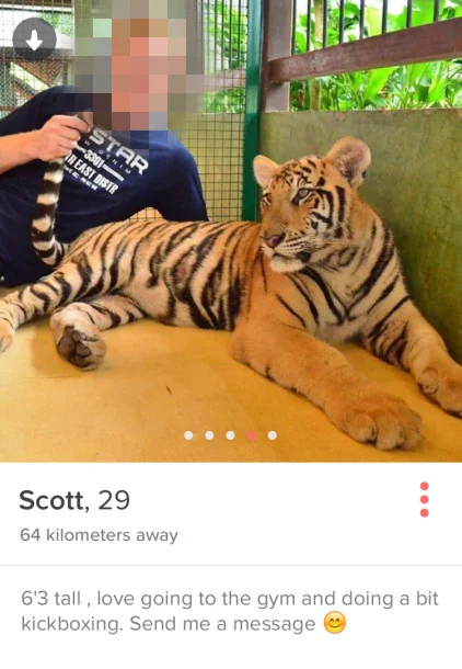 Posing with a tiger also says you're an asshole who doesn't care about what the tiger had to go through for your photo op.