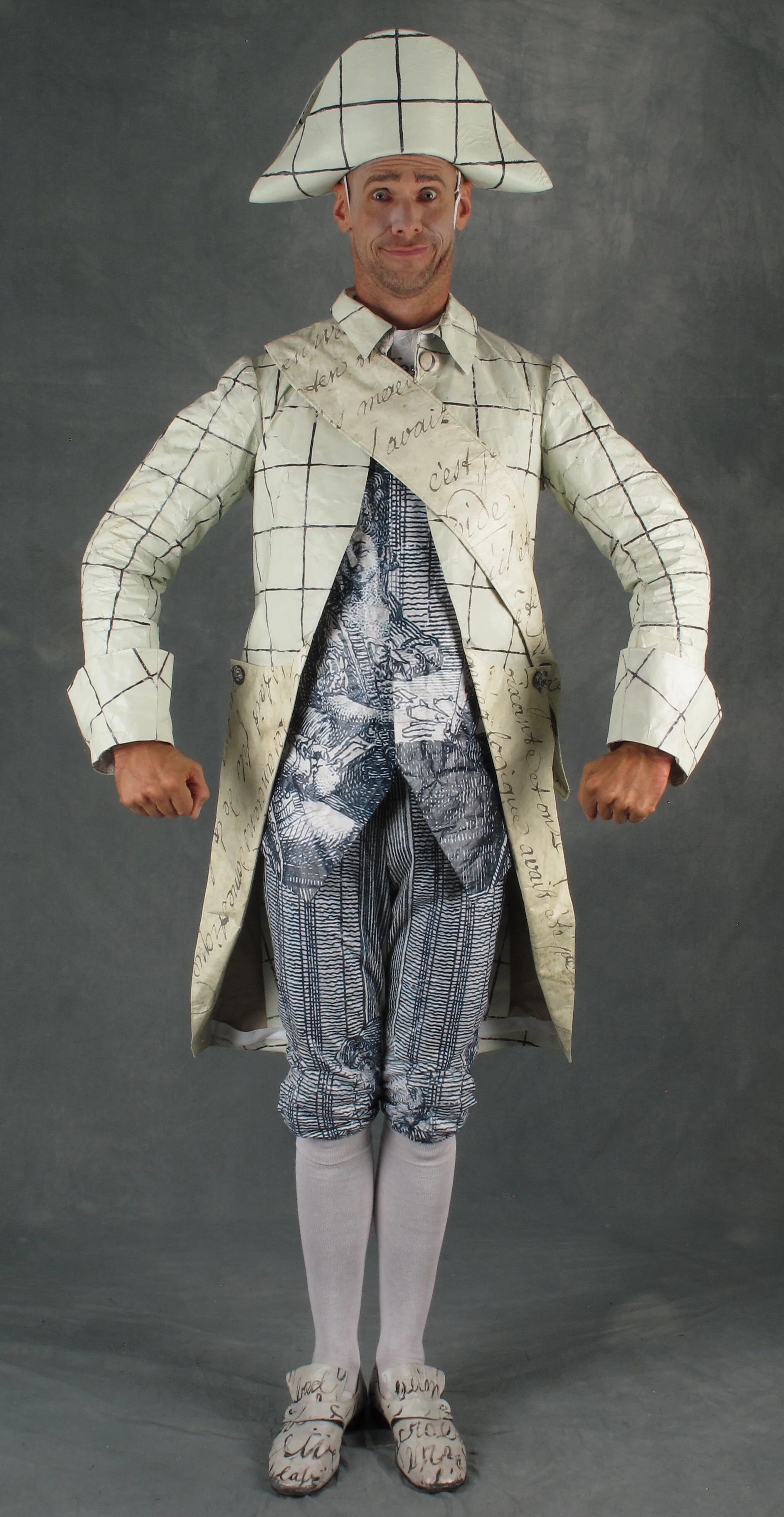   Candide, 2018   Andy Cook, acrobat.  Design: Laurent Pelly, Associate: Jean-Jacques Delmotte  First Hands: Christina Huh and Carolyn Walker  Stitchers: Matthew Smith, Laurel Yao  One of a set of fourteen soldier coats in two colorways. 