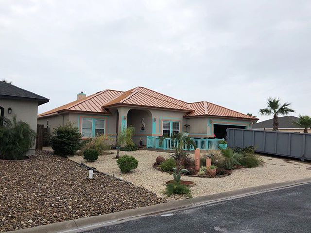 Are you needing a new roof or know someone else who is?

Here's a picture of a home we reroofed on the island in Corpus Christi, TX! It's &quot;Standing Seam Metal&quot; and the color is copper penny.

You can learn more about our residential roofing