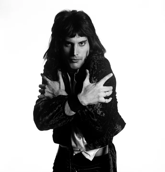 FreddieMercury_HoldingHimself_London1974 Mick Rock.jpg