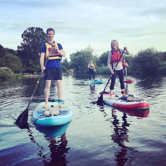 Matthew Clare, one of the owners at Drayton Dental Care, and April Abel, our receptionist, (with Drayton dentists Debbie Paramani and Vasiliki Stamatoukou behind them) have fun on the river.