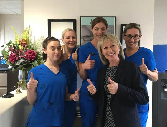 Drayton Dental Care receptionist April Abel (front), with (l-r) dental nurses Hannah Lawley and Courtney Taylor, hygienist Chloe Brotherhood and dentist Debbie Paramani celebrate the CQC’s glowing report.