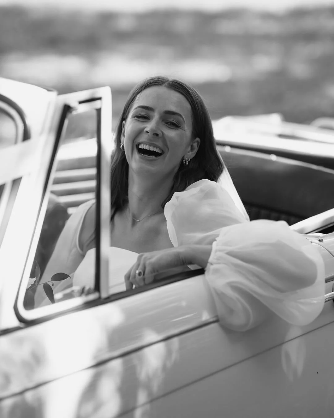 A classic car for a classy lady! 
.
Kate living her ultimate passenger princess life on her wedding day and looking like an absolute movie star whilst doing it! 
.
Calum &amp; Kate were THE MOST joyful, and smiley humans and I just wanted to be their