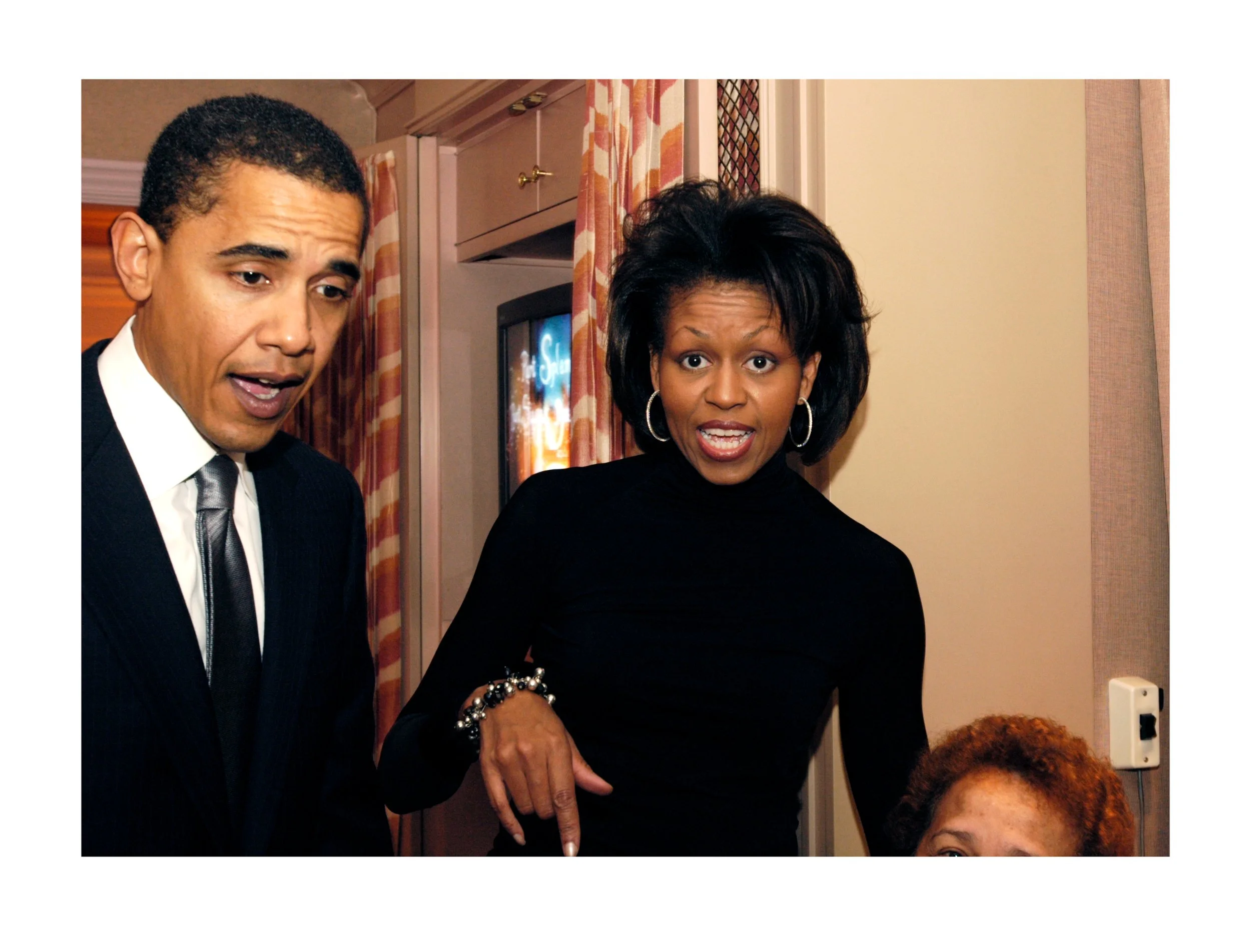 RSY014.OBAMA BARACK AND MICHELLE AT RICE.jpg