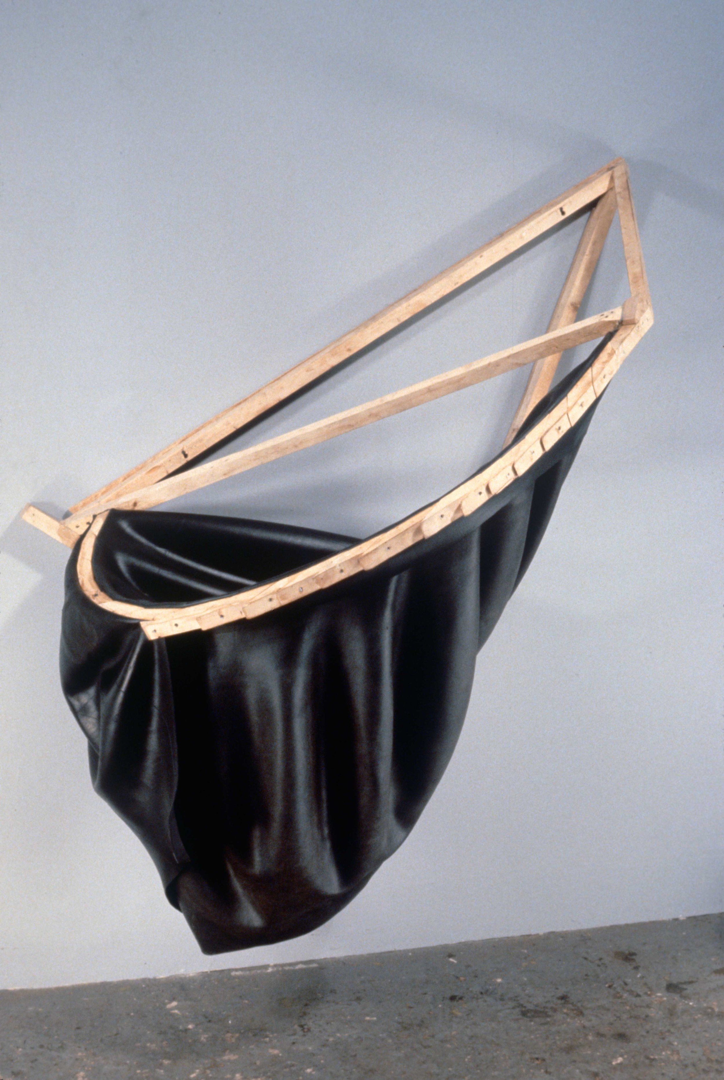   Rubber Sack   1989  rubber and wood  75 X 61 X 35"   