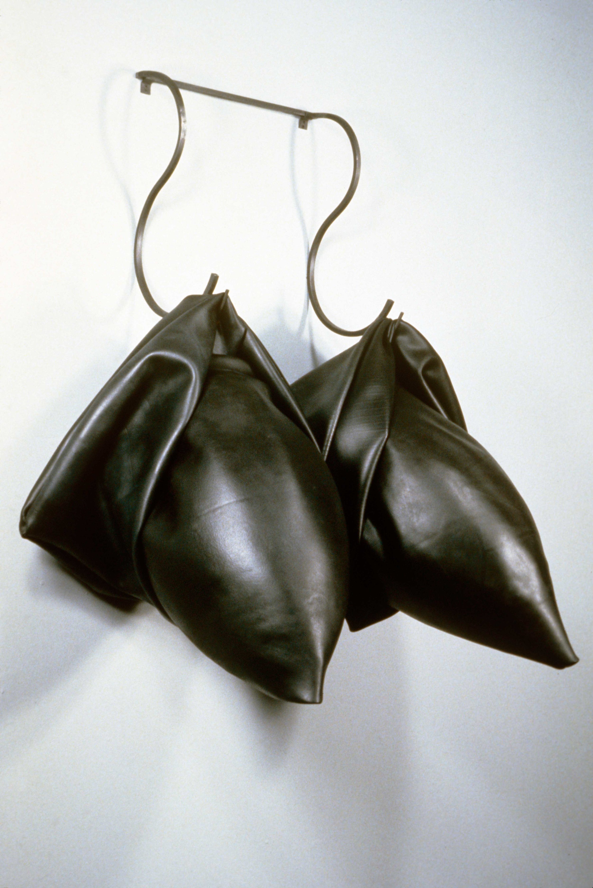   Twin Missiles   1990  rubber and steel  49 X 32 X 23"   