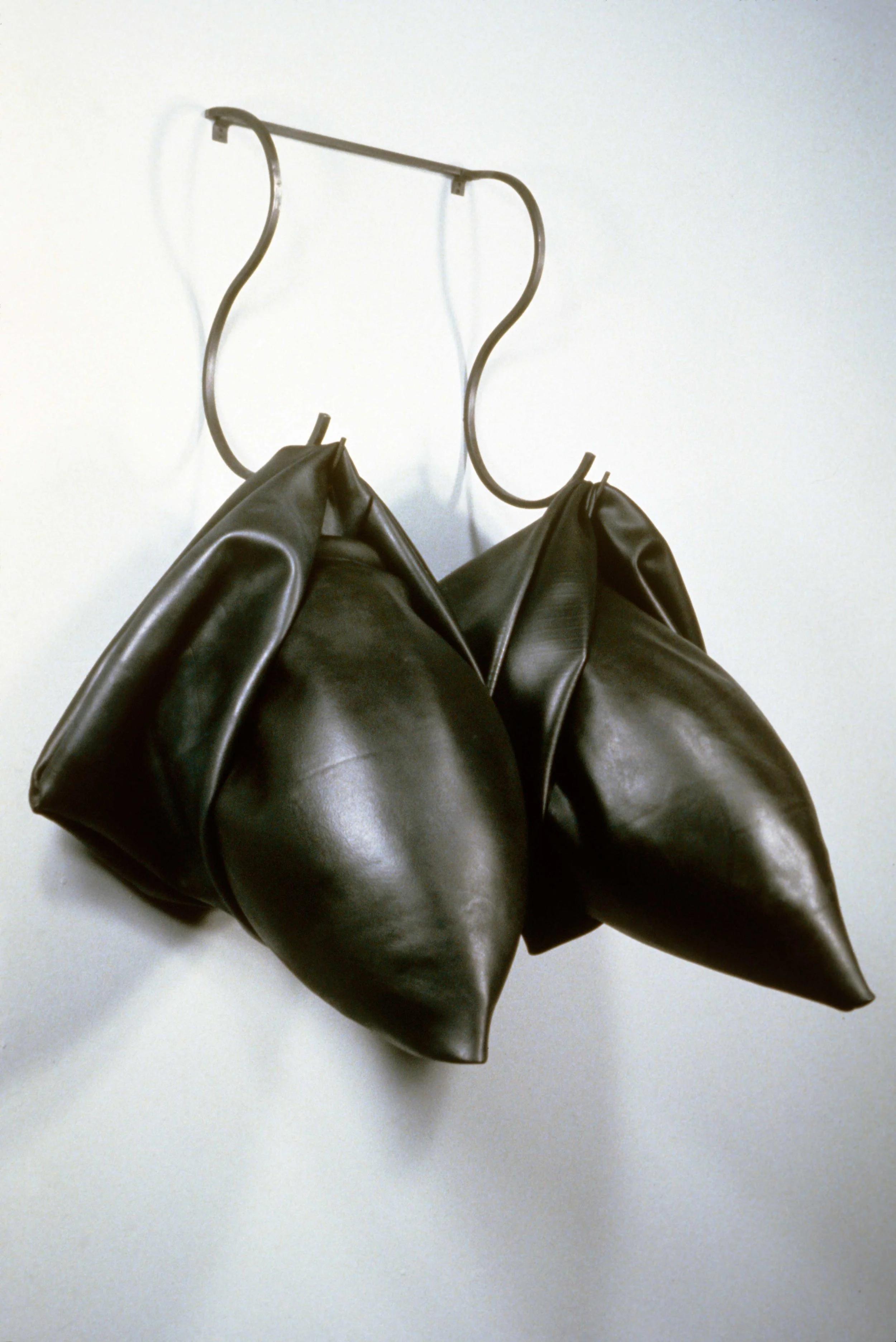 Twin Missiles 1990 rubber and steel 49 X 32 X 23"