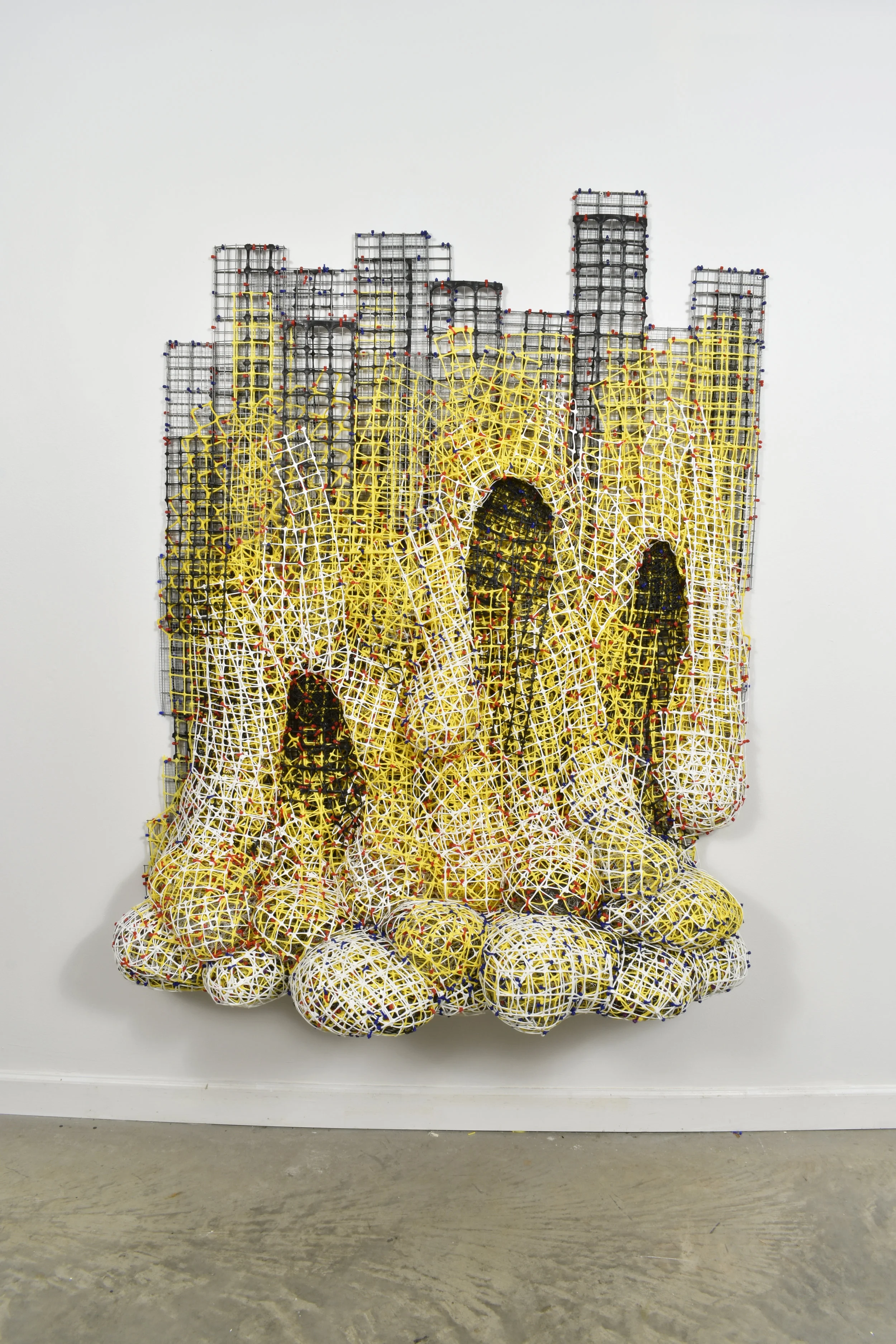 Yellow_Black_White Drip 2017 plastic and metal fencing 70 x 55 x 22”