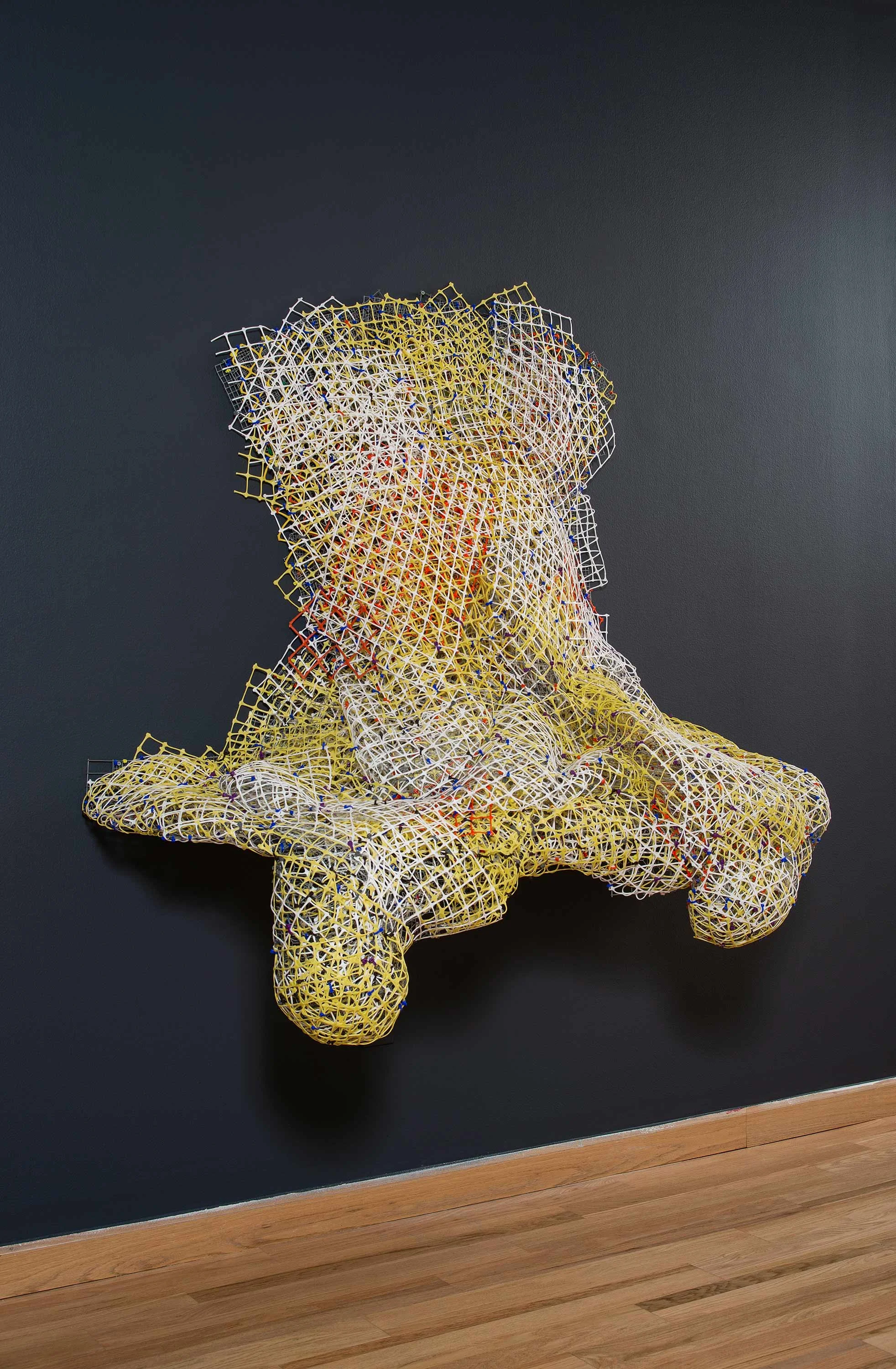 Yellow_White_Orange Drip 2016 plastic and metal fencing 57 x 64 x 27"