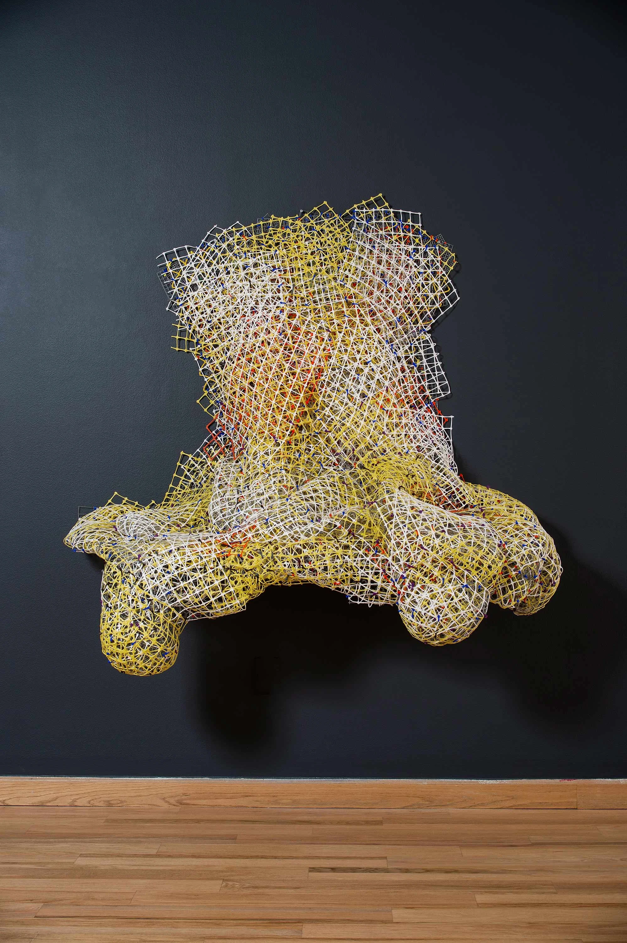 Yellow_White_Orange Drip 2016 plastic and metal fencing 57 x 64 x 27"