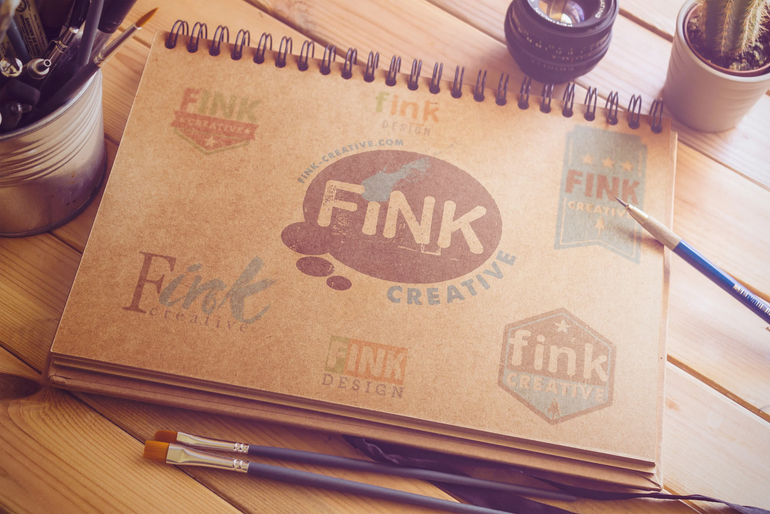 Initial logo concepts and the final, for fink-creative.com