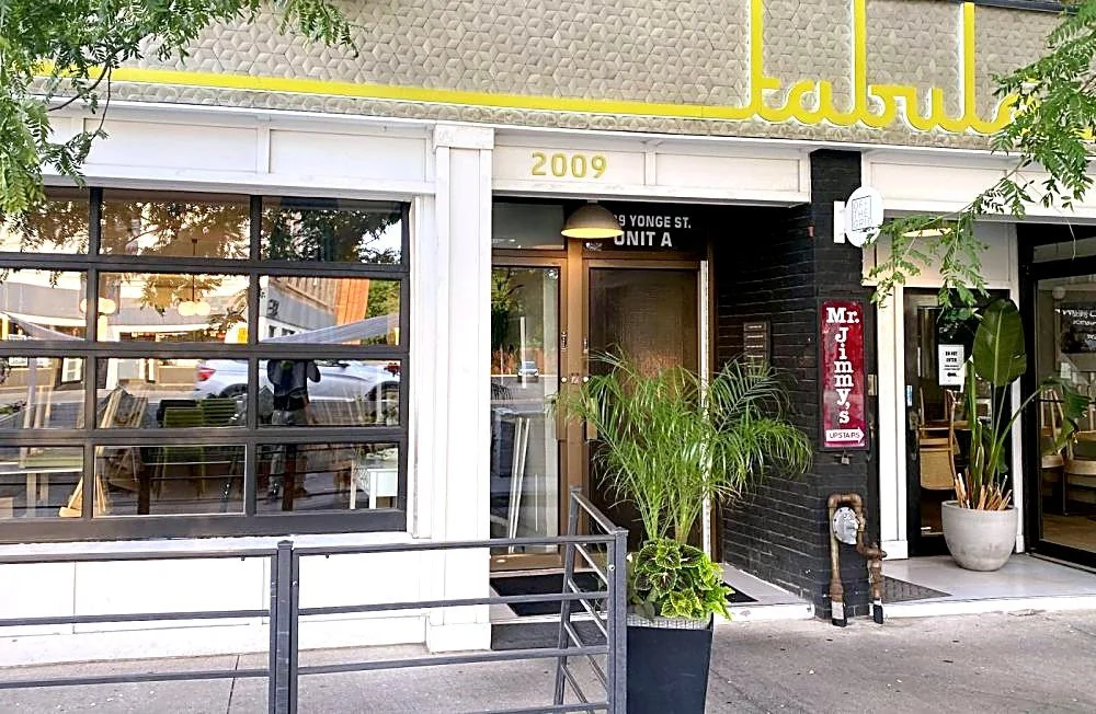 Street-level entrance to Andrew Guthrie's office at 2009 Yonge St., Unit A, beside Tabule restaurant