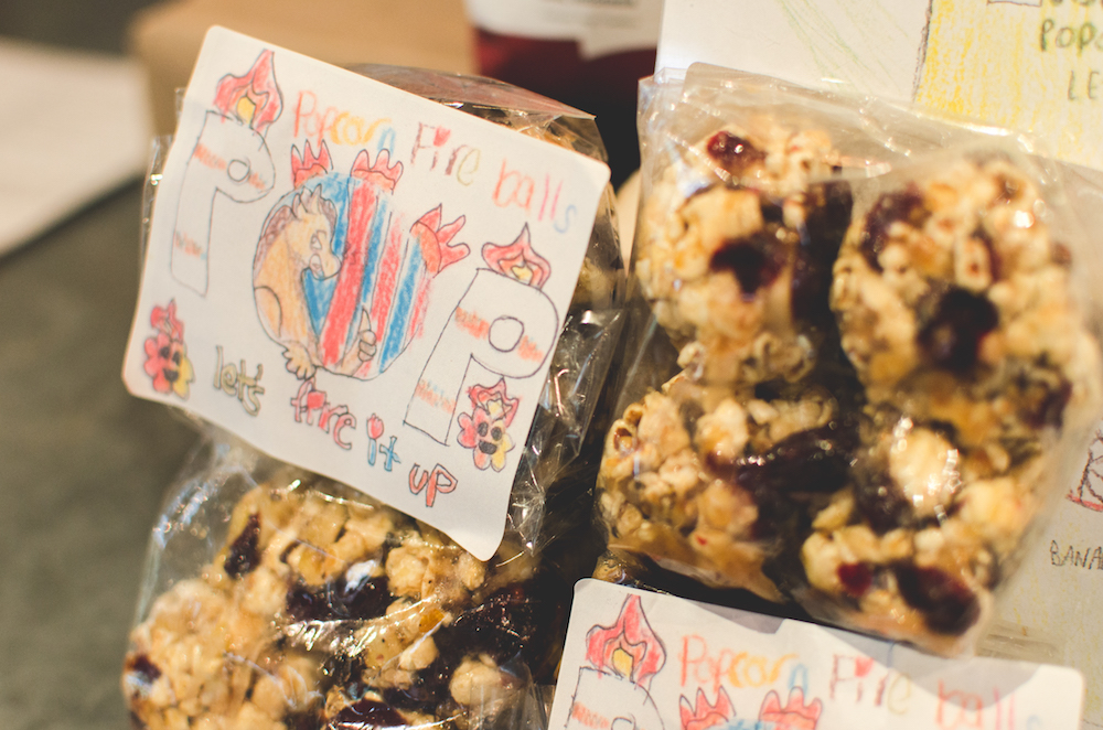 Popcorn Fire Balls are available at Revival through August 31. The packaging was designed by the kids who developed the product. 