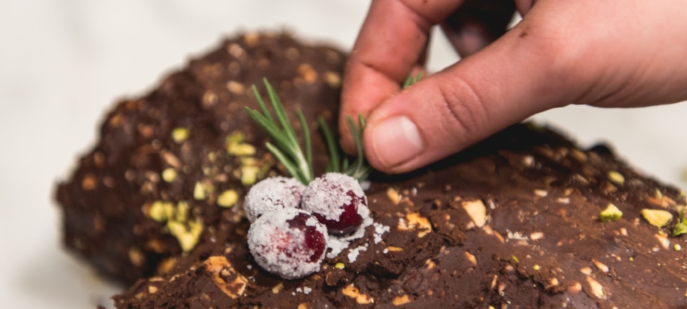 Use cranberries and rosemary sprigs in clusters to create a holly-like effect. 
