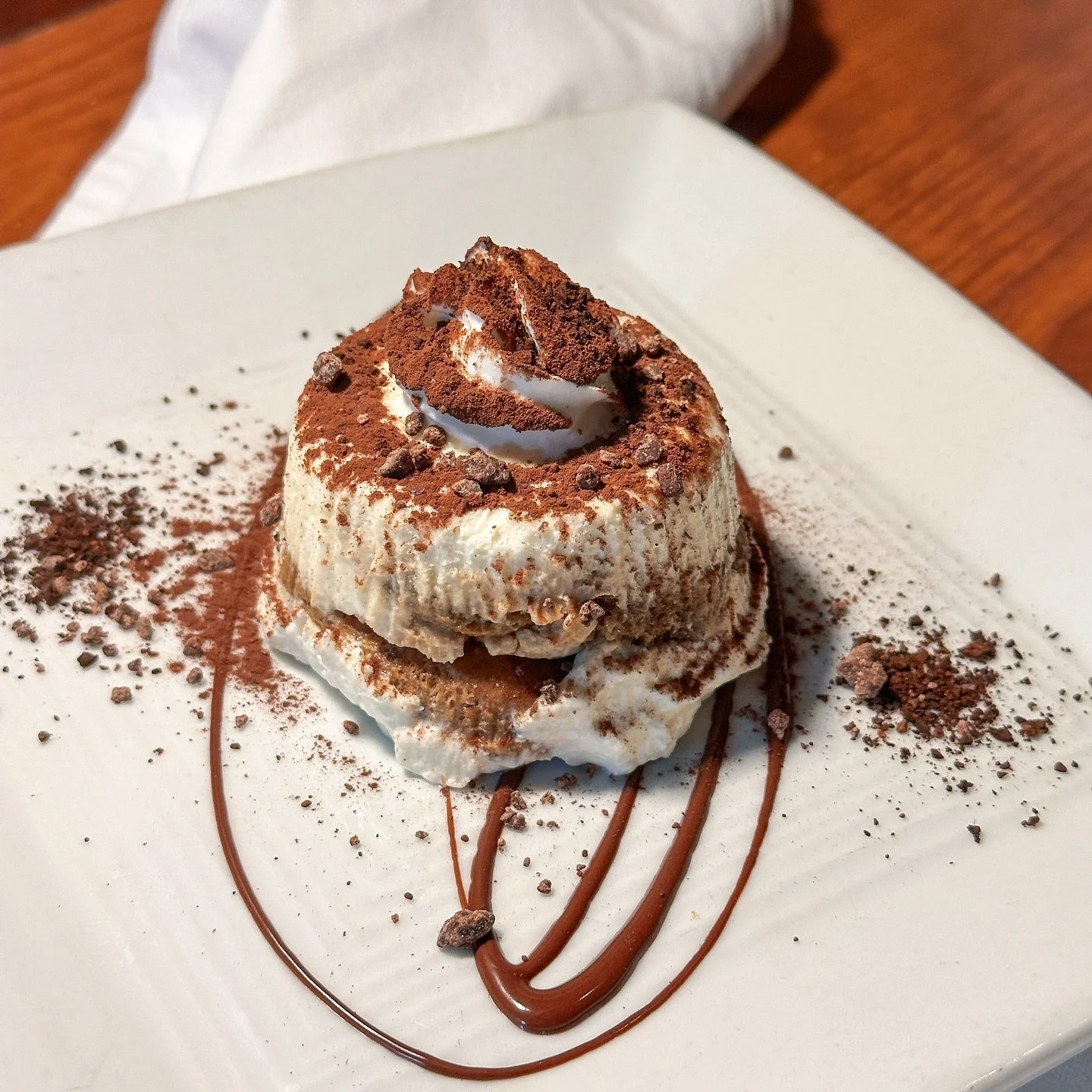 End your meal the Italian way &mdash; with our creamy Tiramis&ugrave;, a dusting of cocoa, and a sip of dessert wine or espresso. Because no meal at Barolo is complete without dolci. 🍷🍰
#SweetEnding #Dolci #SeattleItalian #baroloseattle