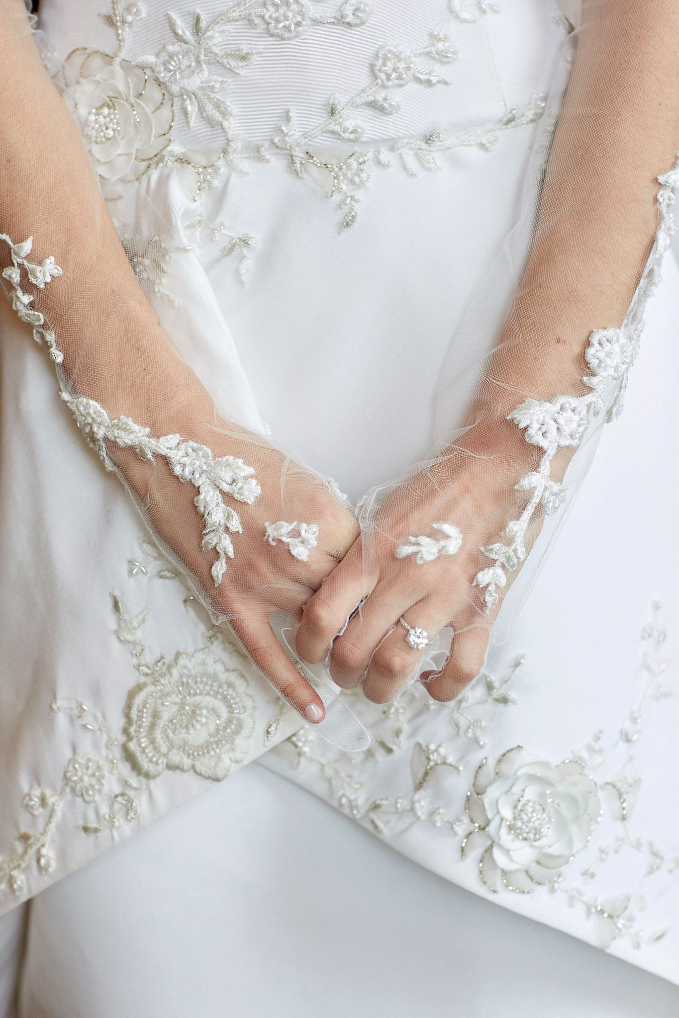 Detail on bride’s custom gloves