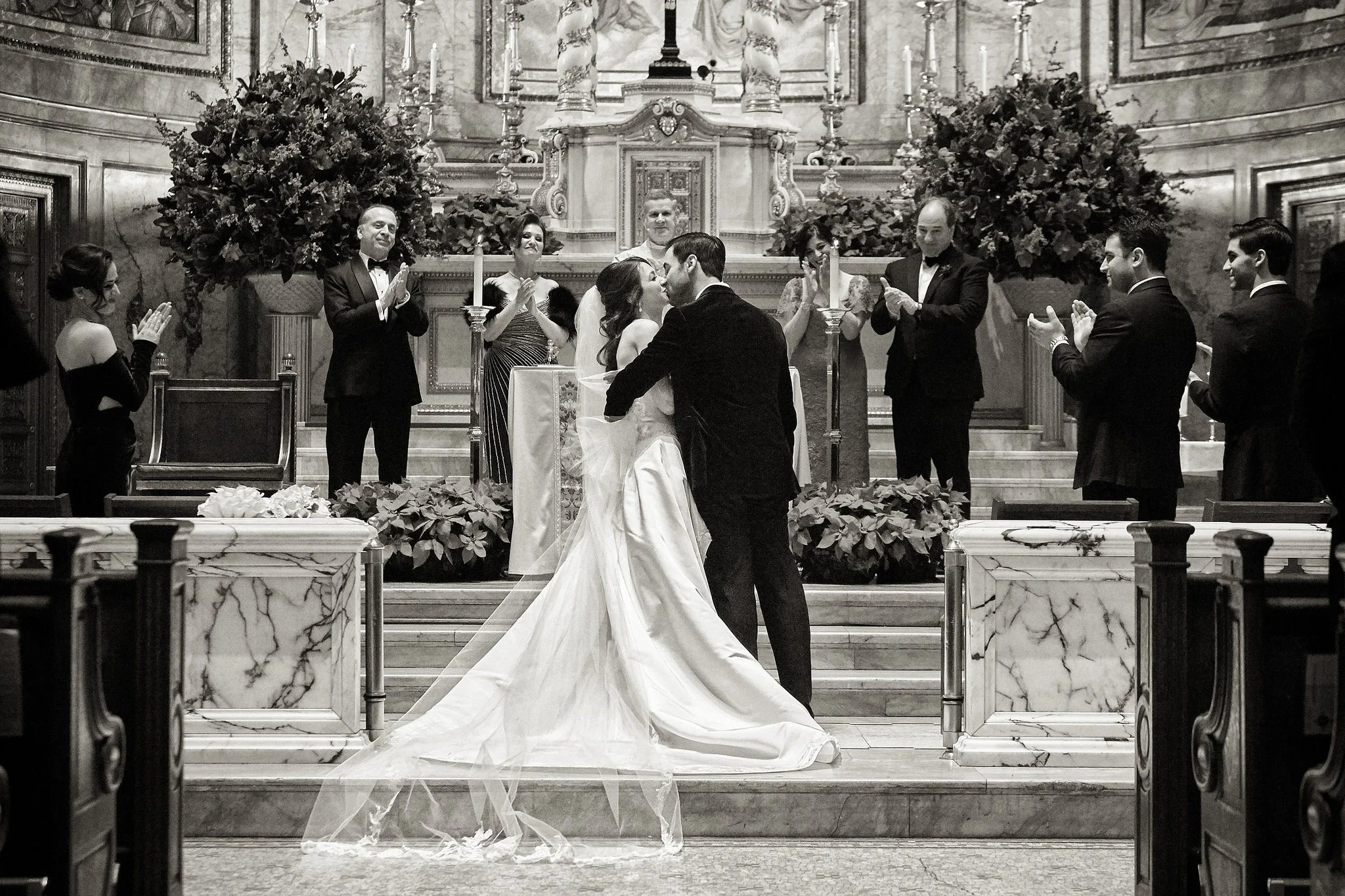First kiss as husband and wife at St. Ignatius Loyola