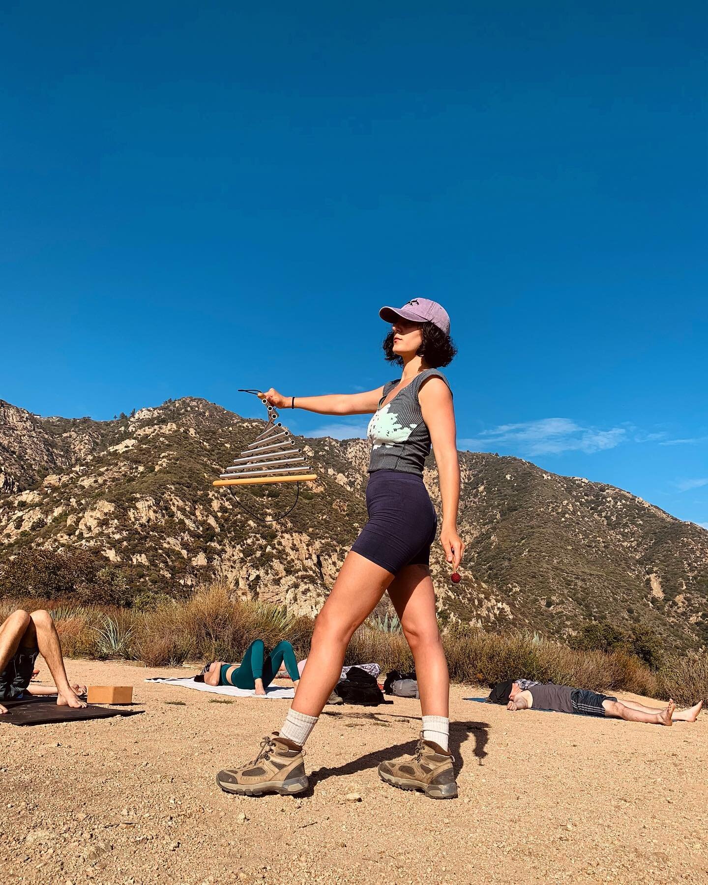 Hi 👋🏽
I&rsquo;m Amanda. You can find me in this embroidered Orca hat, swinging these chimes on a mountain top every month with @yogahikela 🥾🥾🥾
Yoga Hike LA is one of my many offerings (co created w/ @alexhalenda) and I hate to choose favorites b
