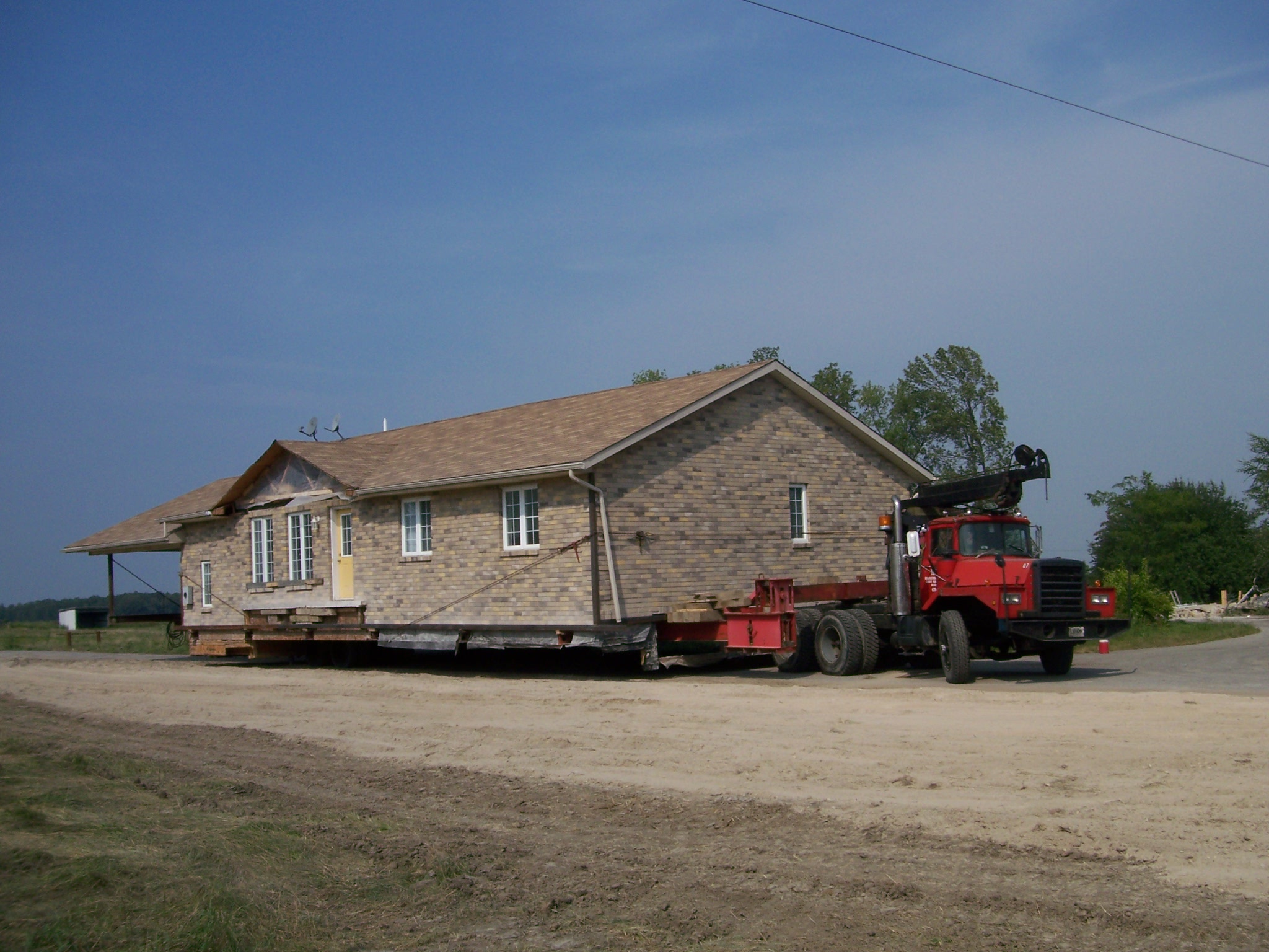 Moving a house away from site