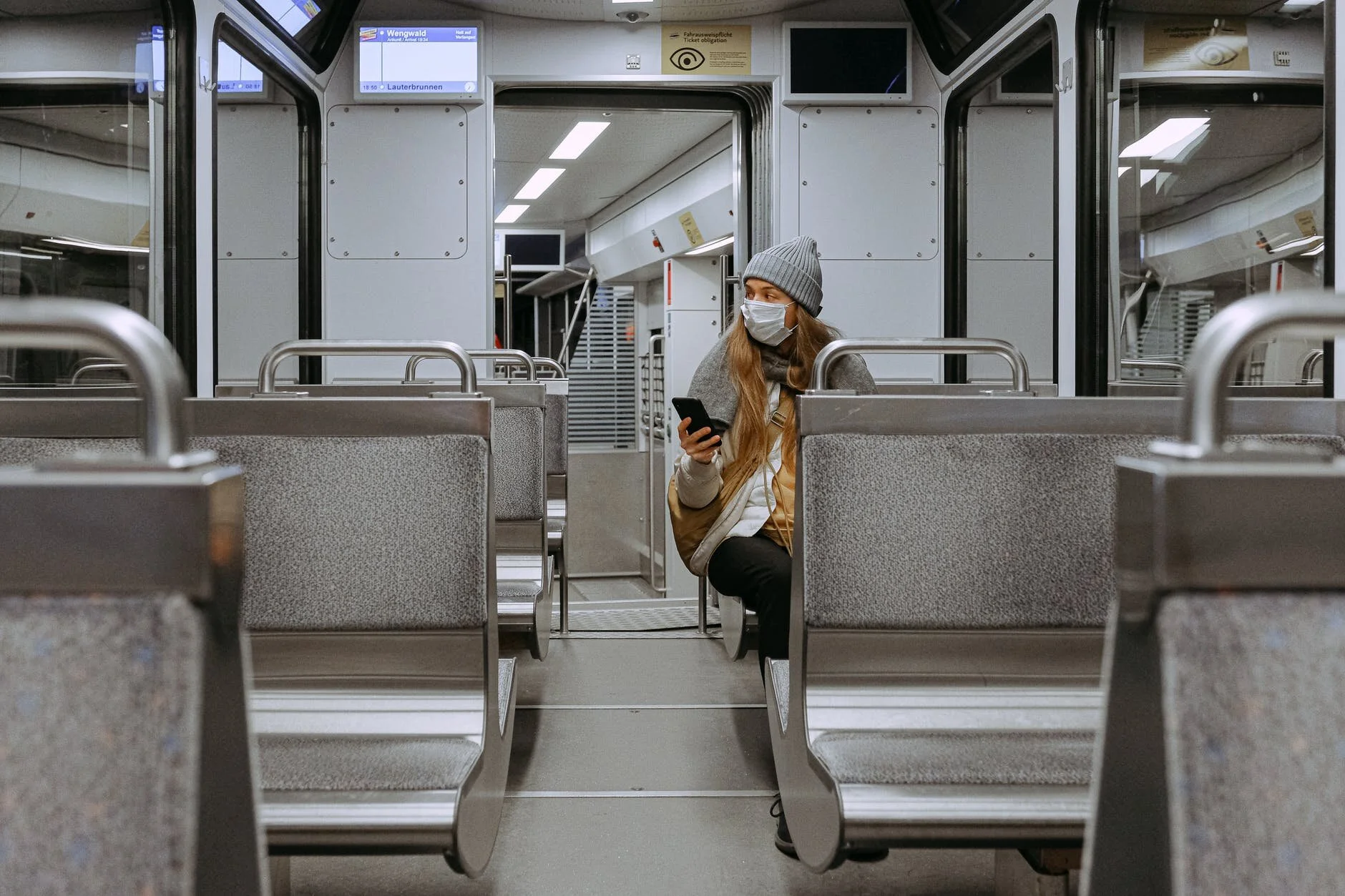 Woman Wearing Mask on Train - Pic by Anna Shevets via pexels.com