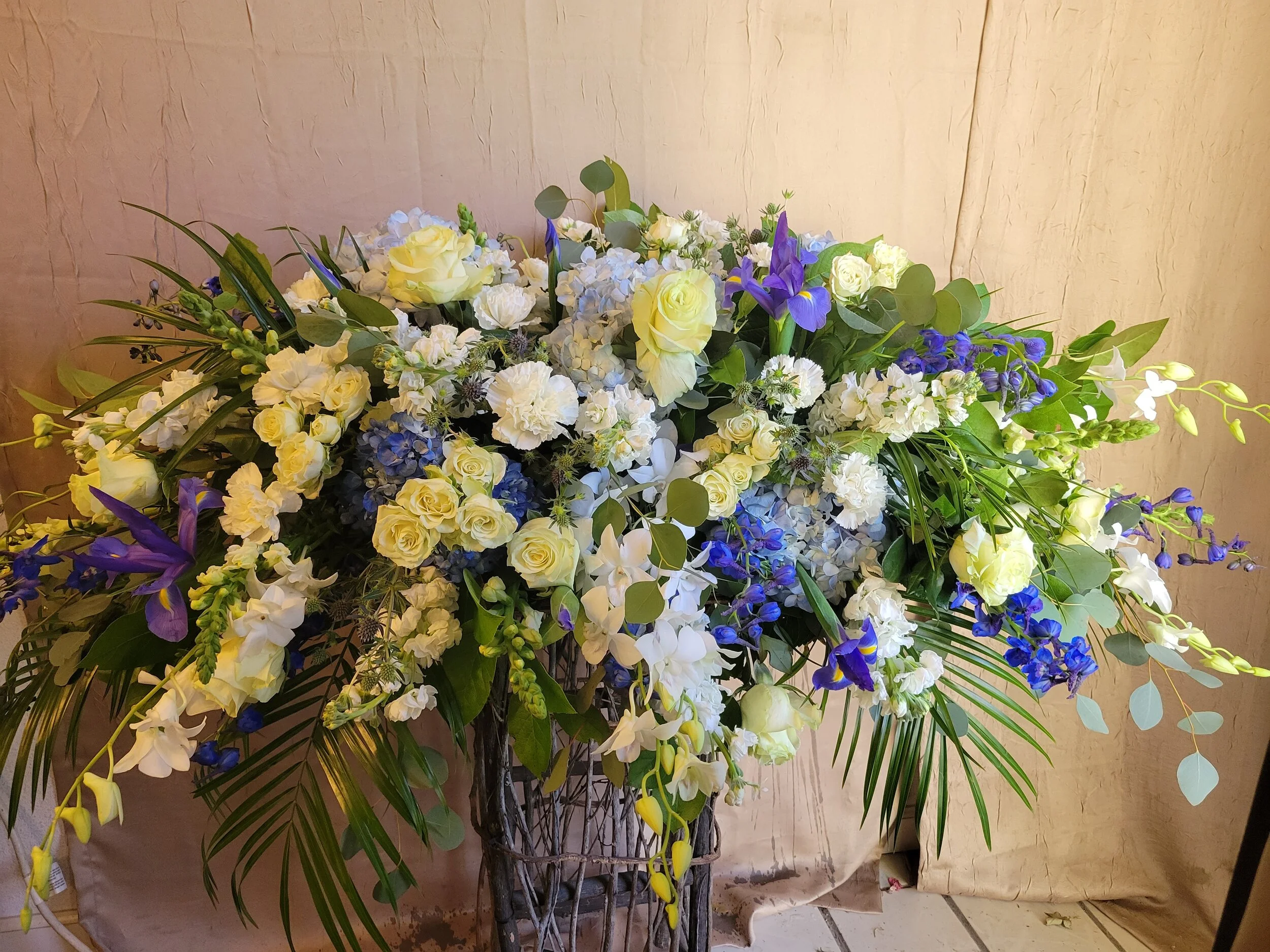 Blue Casket With Flowers