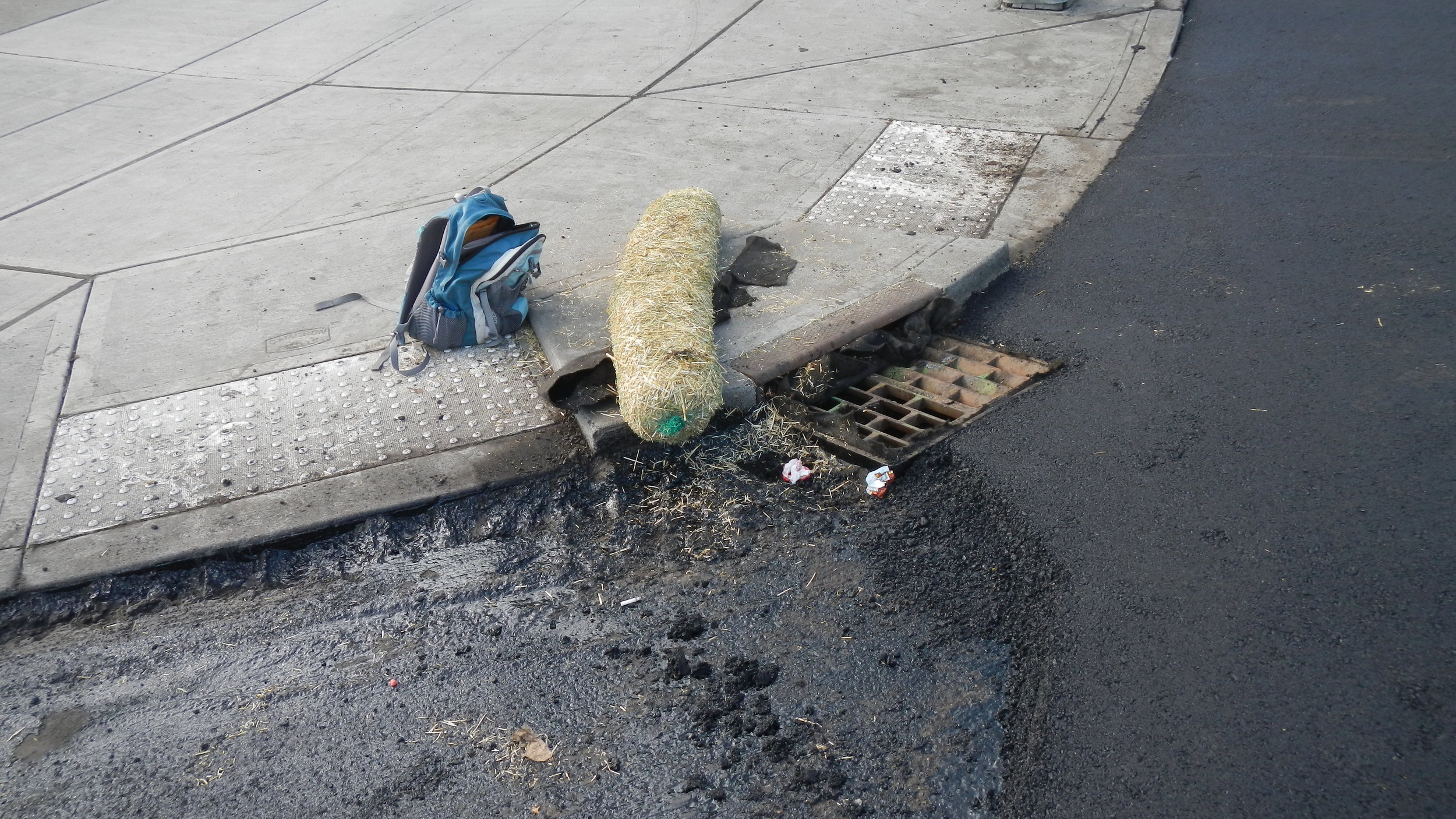 Excessively dirty water and debris plugging the stormwater drain