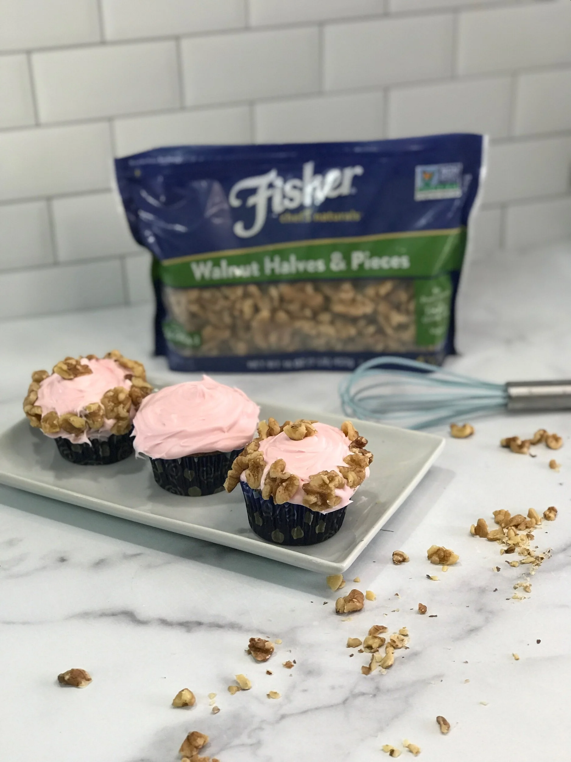 Carrot Cupcakes w/Pink Cream Cheese Frosting Featuring Fisher Brand Walnuts