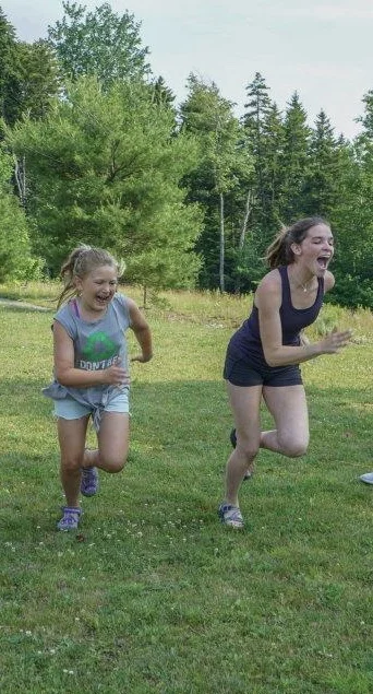 Cece is racing camper-turned-counselor Delaney.